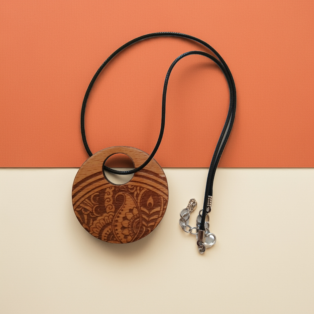 Beautiful Wood Mandala Pattern Engraved Pendant with waxed necklace. Pendant measures 50mm diameter