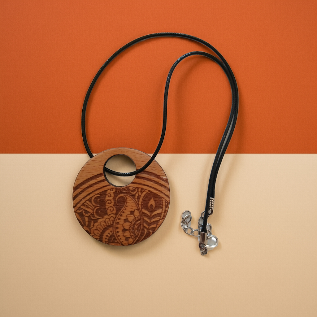Beautiful Wood Mandala Pattern Engraved Pendant with waxed necklace. Pendant measures 50mm diameter
