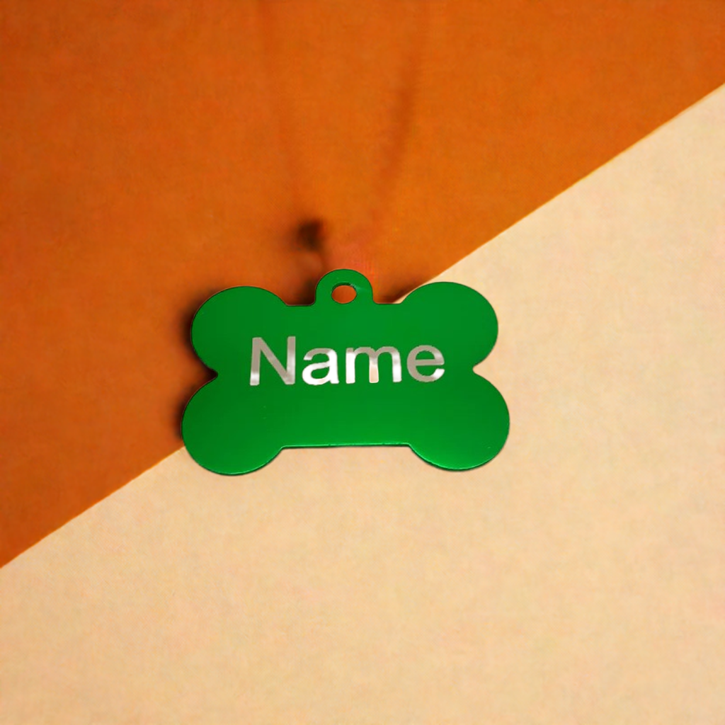 Dog ID Tags. Bone Shaped, with Steel Ring Loop. Variety of Colours. Suits Medium to Larger dogs.