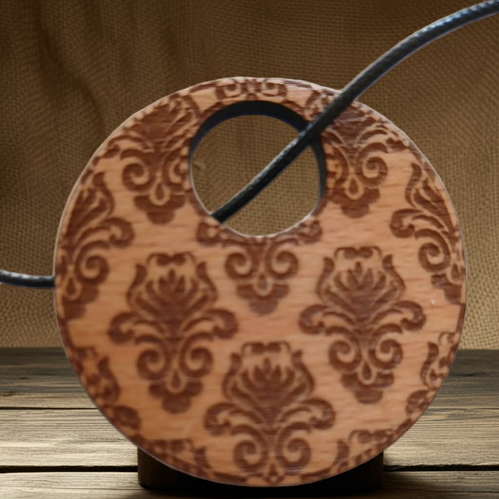 Detailed Wood Flower Pattern Engraved Pendant with waxed necklace. Pendant measures 50mm diameter