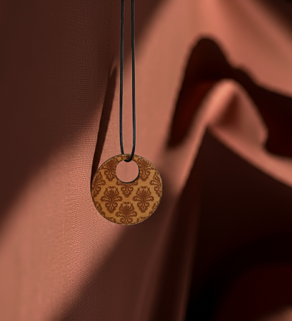 Detailed Wood Flower Pattern Engraved Pendant with waxed necklace. Pendant measures 50mm diameter