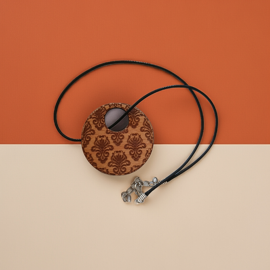 Detailed Wood Flower Pattern Engraved Pendant with waxed necklace. Pendant measures 50mm diameter