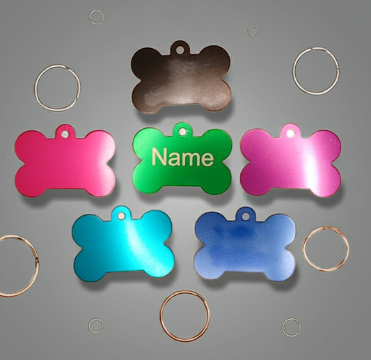 Dog ID Tags. Bone Shaped, with Steel Ring Loop. Variety of Colours. Suits Medium to Larger dogs.