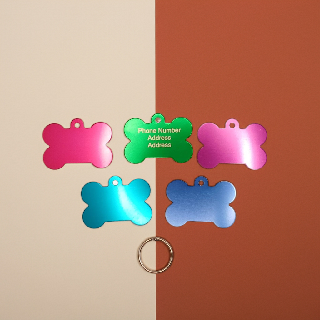 Dog ID Tags. Bone Shaped, with Steel Ring Loop. Variety of Colours. Suits Medium to Larger dogs.