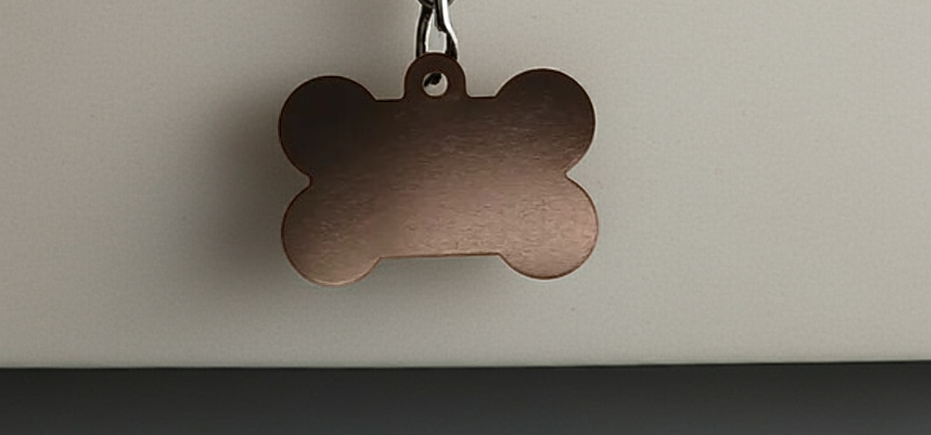 Dog ID Tags. Bone Shaped, with Steel Ring Loop. Variety of Colours. Suits Medium to Larger dogs.