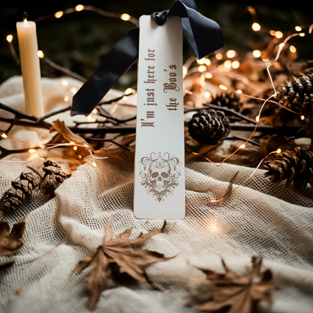 Halloween / Macabre White Topped Wood Bookmark with Black Ribbon and exquisite spooky skull engraving.