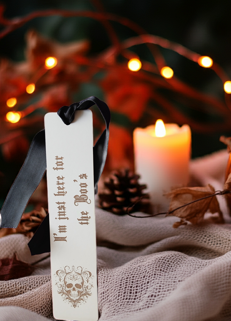 Halloween / Macabre White Topped Wood Bookmark with Black Ribbon and exquisite spooky skull engraving.