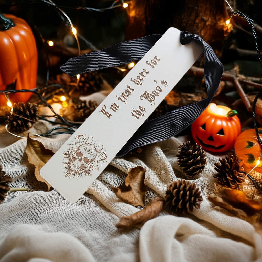 Halloween / Macabre White Topped Wood Bookmark with Black Ribbon and exquisite spooky skull engraving.