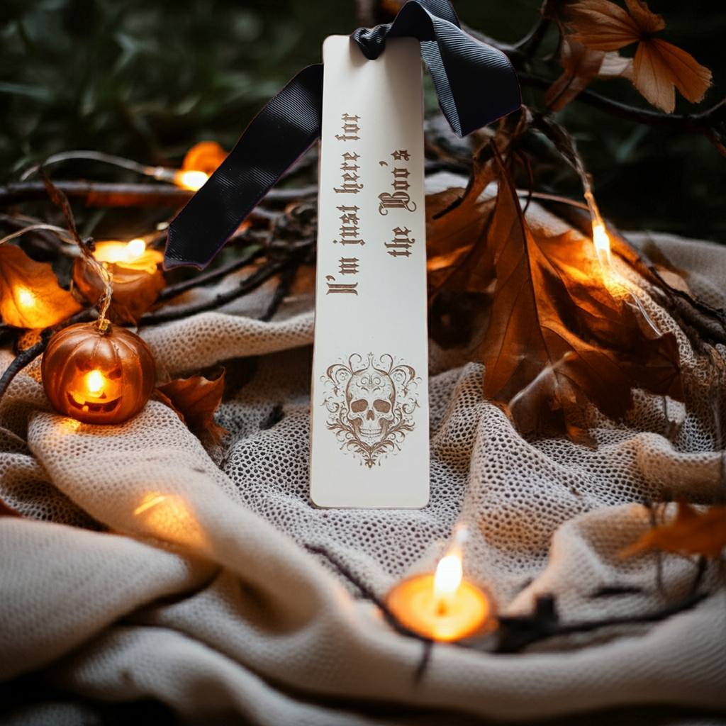 Halloween / Macabre White Topped Wood Bookmark with Black Ribbon and exquisite spooky skull engraving.