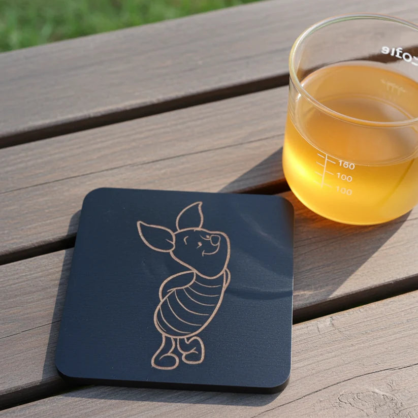 Winnie-The-Pooh Combo,  x6 Black topped wood coasters with bumper feet & 2 Personalised beech bookmarks with tassels.